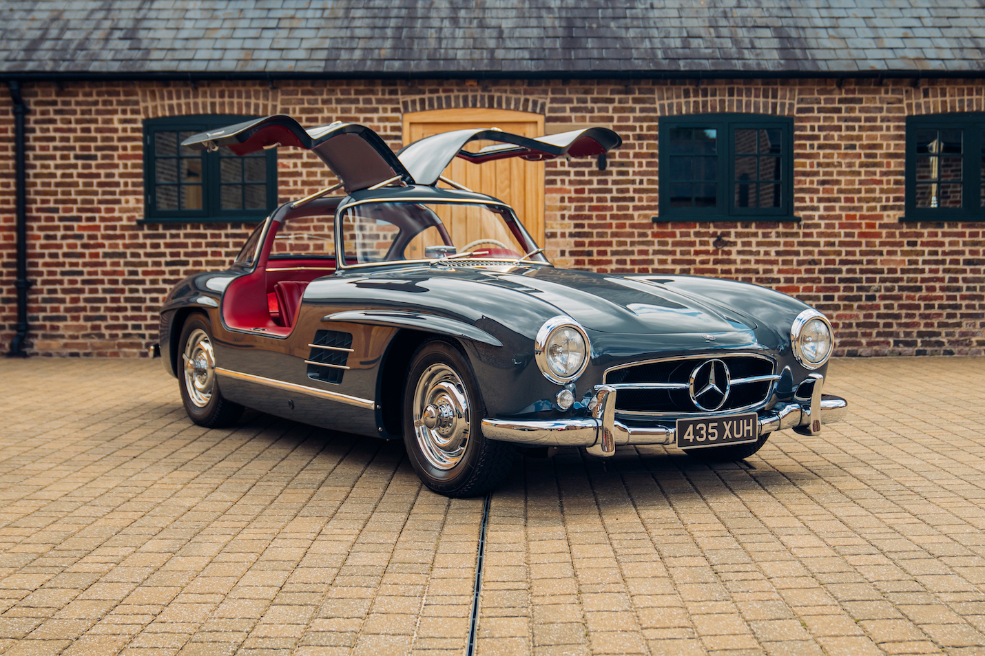 CHARITY AUCTION MERCEDES BENZ 300 SL GULLWING DRIVING